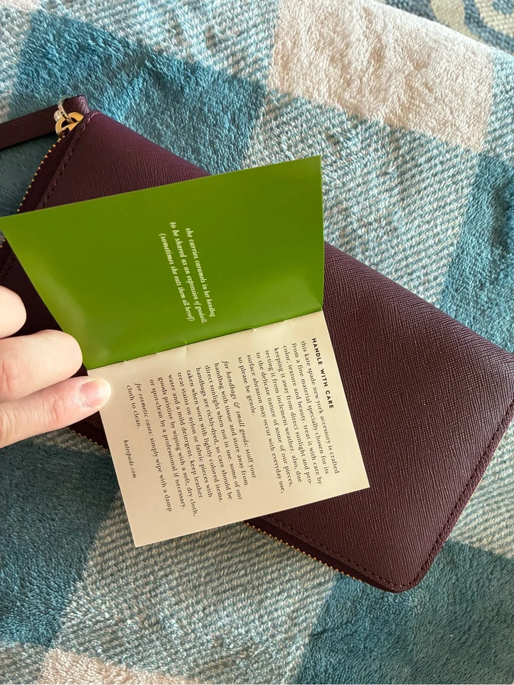 kate spade plum/burgundy zip-around card wallet with gold logo